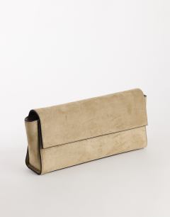 Model wearing Clark medium suedette fold over clutch bag in sand