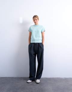 Model wearing Classic tee in blue