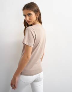 Model wearing Classic tee in stone