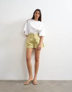 Model wearing Clean a-line short in neutral