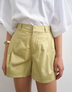 Model wearing Clean a-line short in neutral