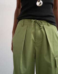 Model wearing Clean A line wide leg cargo with tie waist in khaki