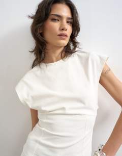 Clean corset seamed cap sleeve top in ivory
