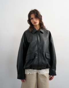 Model wearing Clean faux leather bomber jacket in black