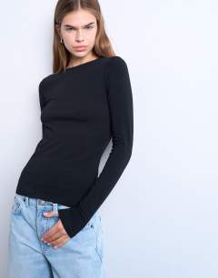 Model wearing Clean long sleeve top in black