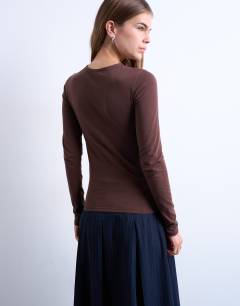 Model wearing Clean long sleeve top in chocolate brown