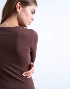Model wearing Clean long sleeve top in chocolate brown