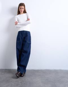 Model wearing Clean long sleeve top in ivory