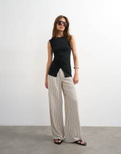 Model wearing Clean ruched tank in black