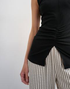 Model wearing Clean ruched tank in black