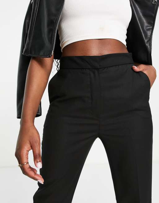 Topshop ribbed flared legging with zip front split hem in black, ASOS