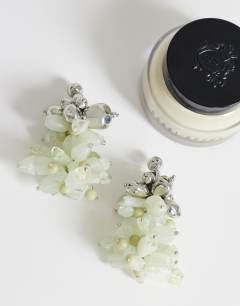 Model wearing Cleo semi precious beaded drop earring in sage and silver