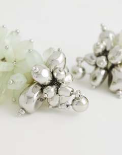 Model wearing Cleo semi precious beaded drop earring in sage and silver