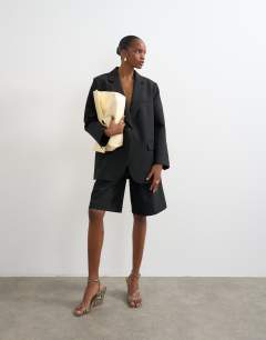 Model wearing Co ord 2 button relaxed fit blazer in black