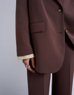 Model wearing Co ord 2 button relaxed fit blazer in chocolate
