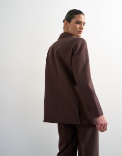 Model wearing Co ord 2 button relaxed fit blazer in chocolate
