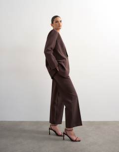 Model wearing Co ord 2 button relaxed fit blazer in chocolate