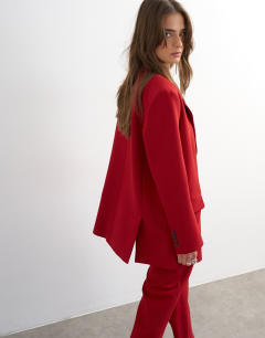 Model wearing Co ord 2 button relaxed fit blazer in red
