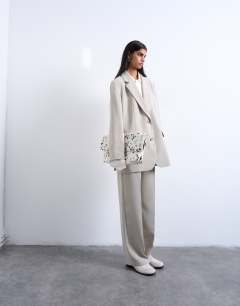 Model wearing Co ord 2 button relaxed fit blazer in stone