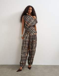 Model wearing Co ord asymmetric neckline top in check