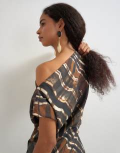 Model wearing Co ord asymmetric neckline top in check