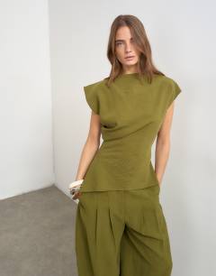 Model wearing Co ord asymmetric neckline top in khaki
