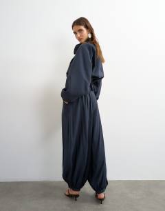 Model wearing Co ord balloon trouser with tie waist in navy