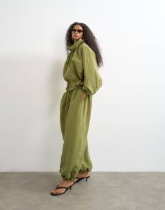 Model wearing Co ord balloon trouser with tie waist in olive