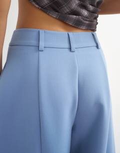 Model wearing Co ord barrel leg trouser in blue