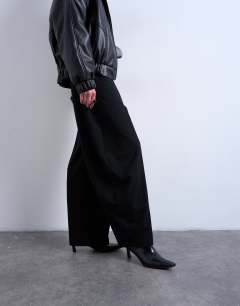 Model wearing Co ord barrel trouser in black