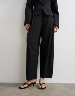 Model wearing Co ord barrel trouser in black
