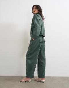 Model wearing Co ord barrel trouser in green stripe