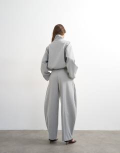 Model wearing Co ord barrel trouser in light grey