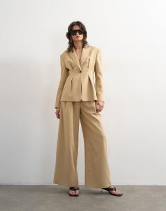 Model wearing Co ord belted highwaisted double pleat trouser in beige