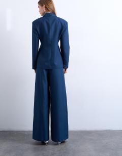 Model wearing Co ord belted highwaisted double pleat trouser in navy