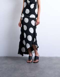 Model wearing Co-ord bias maxi slip skirt in large mono spot