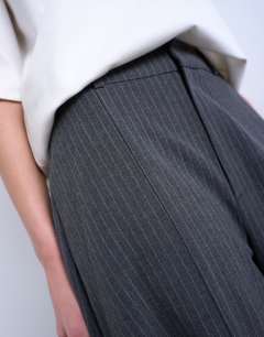 Model wearing Co ord bubble trouser in charcoal stripe