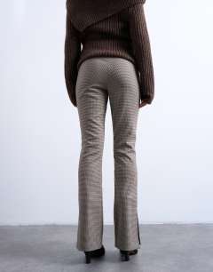 Model wearing Co ord check high waisted tailored trouser in brown
