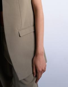 Model wearing Co ord chuck on sleeveless blazer in mushroom
