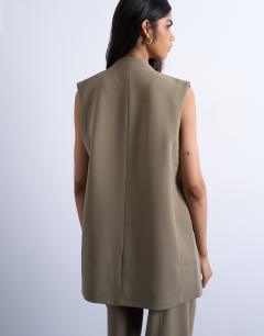 Model wearing Co ord chuck on sleeveless blazer in mushroom