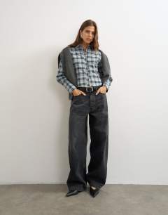Model wearing Co ord cinch check shirt in navy