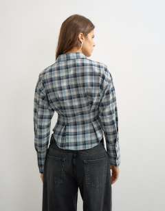 Model wearing Co ord cinch check shirt in navy