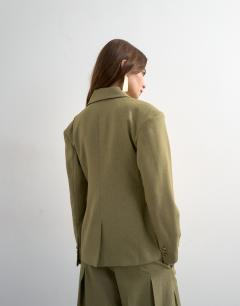 Model wearing Co ord cinched padded shoulder blazer in taupe