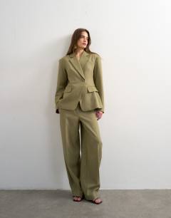 Model wearing Co ord cinched padded shoulder blazer in taupe