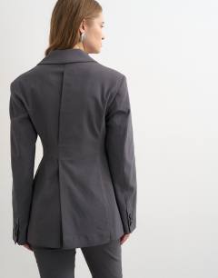 Model wearing Co ord clean cinched blazer in charcoal