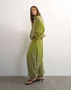 Model wearing Co ord colour block horseshoe trouser in green