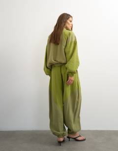 Model wearing Co ord colour block horseshoe trouser in green