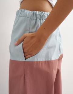 Model wearing Co ord colour block wide leg trouser in blue and mauve