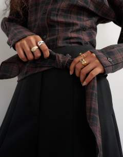 Model wearing Co ord contrast check wrap barrel trouser in black
