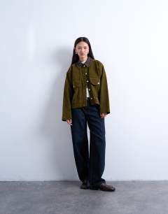 Model wearing Co ord cut cord jacket with contrast cord collar in khaki